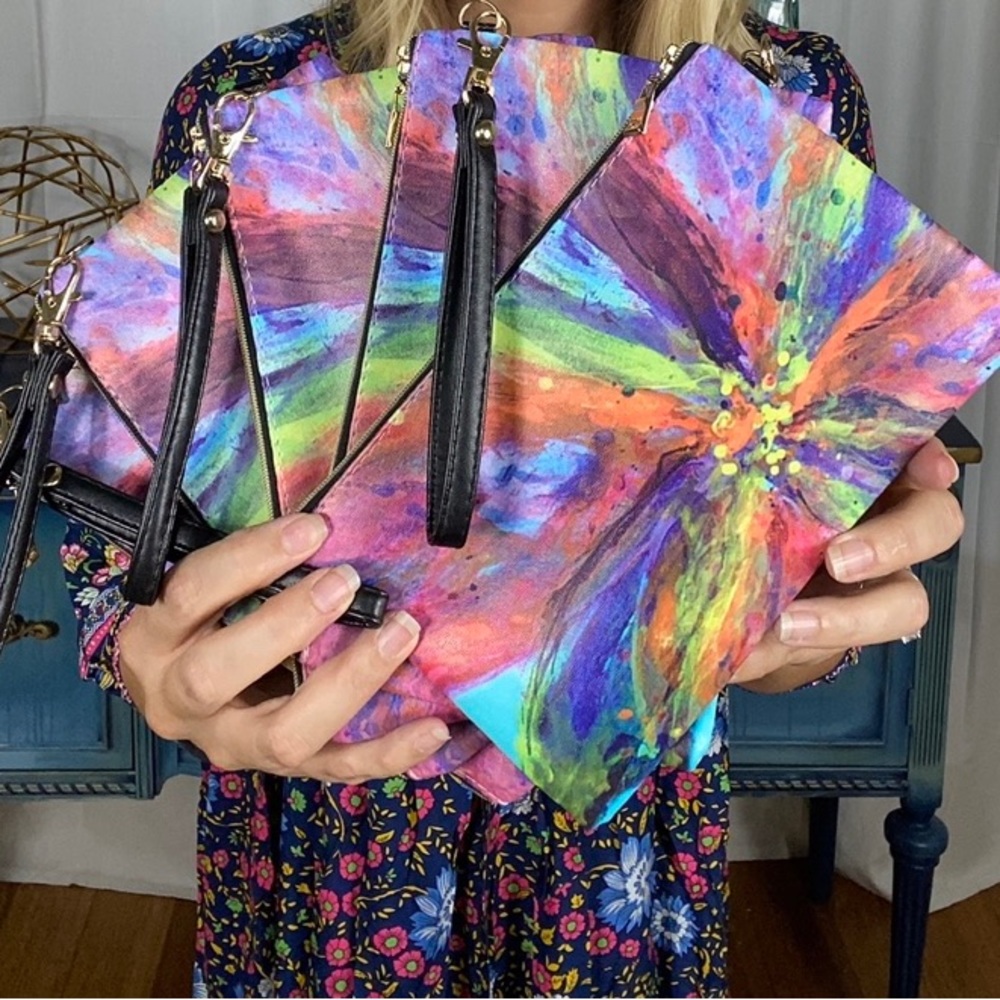 Artistic clutch/wristlet, vegan leather.